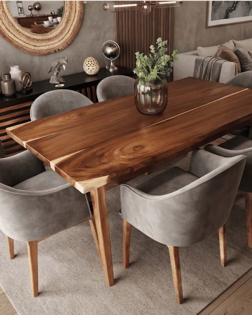Dining table with glass vase, rattan mirror and warm-toned living room beyond